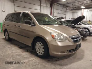 2006 Honda Odyssey LX with VIN 5FNRL38256B113667, listed as a IAAI auction lot 41856860 with 142,031 mi miles. Bid and sale history available at carsss.com. Image 1.