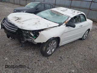 2008 Chrysler Sebring Limited with VIN 1C3LC65M48N289969, listed as a IAAI auction lot 41963154 with Not provided miles and . Bid and sale history available at DreamBid. Image 2.