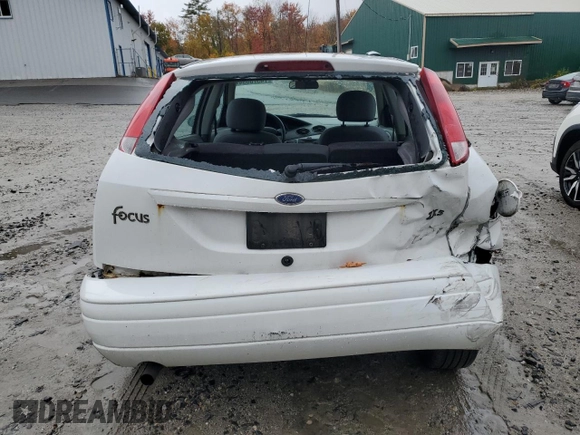 2004 Ford Focus with VIN 3FAFP37Z94R101447, listed as a Copart auction lot 74570054 with 162,166 mi miles and Salvage title. Bid and sale history available at DreamBid. Image 6.