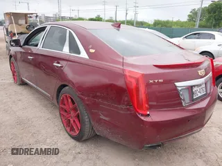 2017 Cadillac XTS Luxury with VIN 2G61M5S36H9134285, listed as a IAAI auction lot 42076660 with 197,985 mi miles. Bid and sale history available at carsss.com. Image 3.