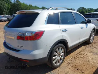 2010 Mazda CX-9 Grand Touring with VIN JM3TB3MA6A0230906, listed as a IAAI auction lot 42422826 with 191,821 mi miles and . Bid and sale history available at DreamBid. Image 4.