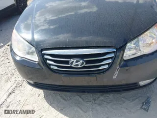2010 Hyundai Elantra GLS with VIN KMHDU4AD8AU176976, listed as a IAAI auction lot 42044034 with 185,555 mi miles. Bid and sale history available at carsss.com. Image 6.