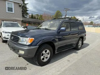 2002 Toyota Land Cruiser z VIN JTEHT05J622022972, wystawiony jako Copart lot #59201475 z przebiegiem 299 548 mil mil oraz Czysty tytuł • Clean title. Historia ofert i sprzedaży dostępna na DreamBid. Obrazek 2.