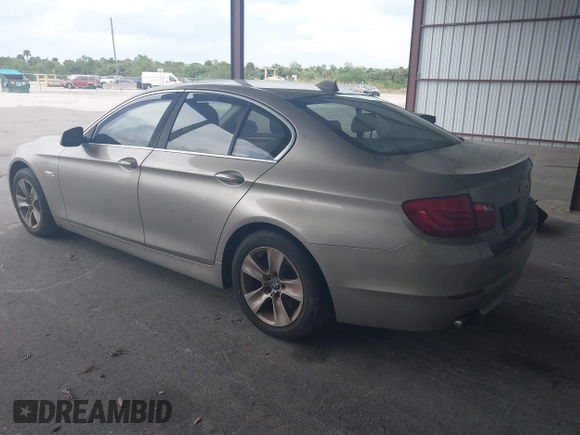 2013 BMW 5 Series 528i with VIN WBAXG5C52DDY35141, listed as a IAAI auction lot 41883031 with 112,917 mi miles and . Bid and sale history available at carsss.com. Image 3.