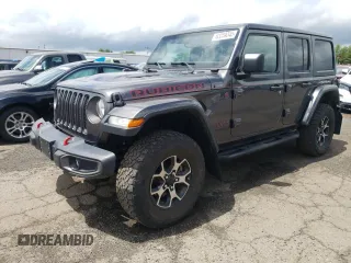 2018 Jeep Wrangler Unlimited Rubicon with VIN 1C4HJXFG1JW261472, listed as a Copart auction lot 63259345 with 60,457 mi miles and Salvage title. Bid and sale history available at DreamBid. Image 1.