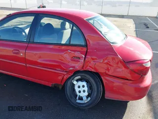 2002 Kia Rio with VIN KNADC123526160314, listed as a IAAI auction lot 41527989 with 124,252 mi miles. Bid and sale history available at carsss.com. Image 18.