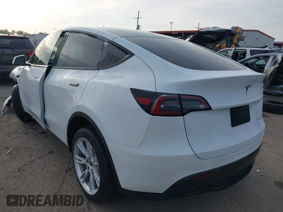 2023 Tesla Model Y Long Range with VIN 7SAYGDEE4PF770307, listed as a IAAI auction lot 42141175 with 34,901 mi miles and . Bid and sale history available at carsss.com. Image 3.