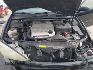 2004 Toyota Camry LE with VIN 4T1BF30K34U080477, listed as a IAAI auction lot 41956998 with 135,441 mi miles. Bid and sale history available at carsss.com. Image 10.