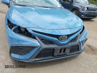 2023 Toyota Camry SE z VIN 4T1T11AK0PU115695, wystawiony jako IAAI lot #42221720 z przebiegiem 67 575 mil mil oraz . Historia ofert i sprzedaży dostępna na DreamBid. Obrazek 12.