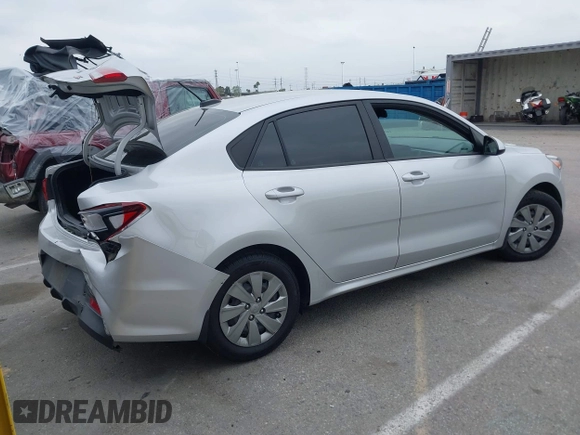 2020 Kia Rio LX with VIN 3KPA24AD7LE313579, listed as a IAAI auction lot 41884205 with 112,586 mi miles and . Bid and sale history available at DreamBid. Image 4.