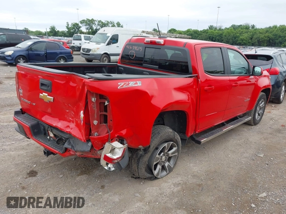 2020 Chevrolet Colorado 4WD Z71 with VIN 1GCGTDEN9L1105636, listed as a IAAI auction lot 42634615 with 106,469 mi miles and . Bid and sale history available at DreamBid. Image 4.