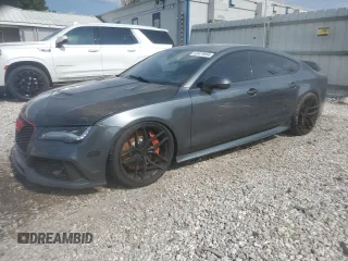 2014 Audi RS 7 Prestige z VIN WUAW2AFC0EN904083, wystawiony jako Copart lot #63479854 z przebiegiem 80 093 mil mil oraz Szkody całkowita. Historia ofert i sprzedaży dostępna na DreamBid. Obrazek 1.
