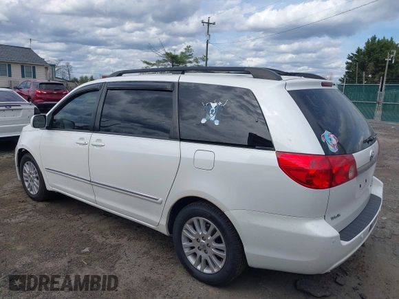 2009 Toyota Sienna XLE with VIN 5TDZK22C79S259793, listed as a IAAI auction lot 41905617 with 185,121 mi miles and . Bid and sale history available at DreamBid. Image 3.