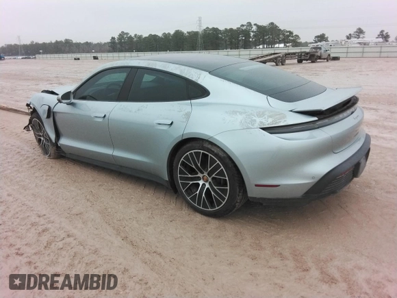2021 Porsche Taycan z VIN WP0AA2Y14MSA18735, wystawiony jako Copart lot #72616054 z przebiegiem Nie podano mil oraz Szkoda całkowita • Salvage title. Historia ofert i sprzedaży dostępna na DreamBid. Obrazek 2.