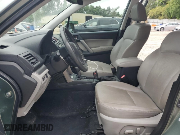 2015 Subaru Forester Touring with VIN JF2SJAWC0FH561212, listed as a Copart auction lot 56470495 with 100,730 mi miles and Salvage title. Bid and sale history available at DreamBid. Image 7.