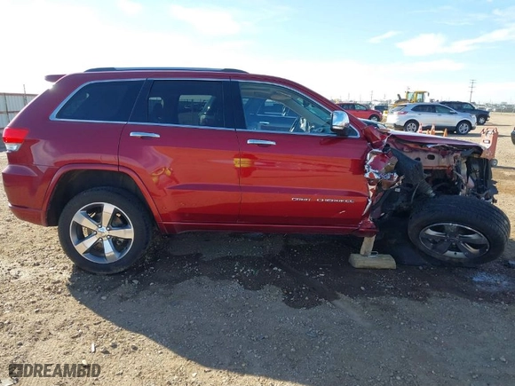 2014 Jeep Grand Cherokee Overland with VIN 1C4RJFCGXEC280970, listed as a IAAI auction lot 41504380 with 115,534 mi miles. Bid and sale history available at carsss.com. Image 13.