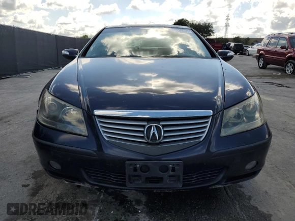 2005 Acura RL z VIN JH4KB165X5C004380, wystawiony jako Copart lot #54139035 z przebiegiem 144 934 mil mil oraz Szkoda całkowita • Salvage title. Historia ofert i sprzedaży dostępna na DreamBid. Obrazek 5.