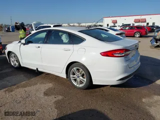 2018 Ford Fusion Hybrid SE with VIN 3FA6P0LU7JR188124, listed as a IAAI auction lot 41760184 with 74,731 mi miles. Bid and sale history available at carsss.com. Image 3.