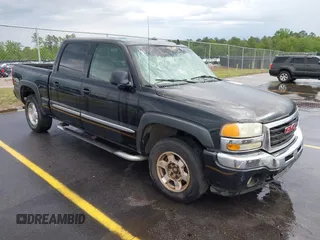 2006 GMC Sierra 1500 SLT with VIN 2GTEK13T561232618, listed as a IAAI auction lot 42086899 with 310,473 mi miles and . Bid and sale history available at carsss.com. Image 1.