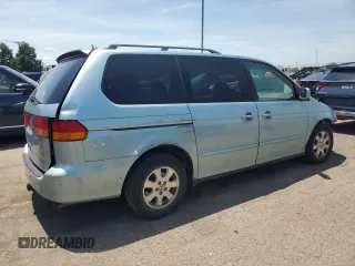 2004 Honda Odyssey EX-L with VIN 5FNRL18014B015462, listed as a Copart auction lot 62834665 with 323,817 mi miles and Salvage title. Bid and sale history available at DreamBid. Image 3.