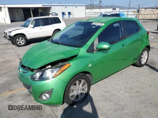 2011 Mazda 2 Touring z VIN JM1DE1HZ4B0115764, wystawiony jako Copart lot #56161455 z przebiegiem 134 274 mil mil oraz Szkoda całkowita • Salvage title. Historia ofert i sprzedaży dostępna na DreamBid. Obrazek 1.
