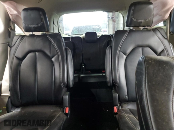 2023 Chrysler Pacifica Touring L with VIN 2C4RC1BG3PR582271, listed as a Copart auction lot 51644595 with 57,930 mi miles and Salvage title. Bid and sale history available at DreamBid. Image 10.