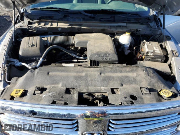 2013 Ram 1500 SLT z VIN 1C6RR7GG0DS668536, wystawiony jako Copart lot #81799564 z przebiegiem 200 594 mil mil oraz Szkoda całkowita • Salvage title. Historia ofert i sprzedaży dostępna na DreamBid. Obrazek 11.