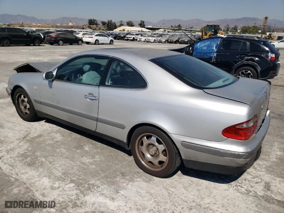 1999 Mercedes-Benz CLK-Class with VIN WDBLJ65G9XF065356, listed as a Copart auction lot 73586424 with 228,410 mi miles and Salvage Title. Bid and sale history available at carsss.com. Image 2.