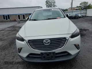 2016 Mazda CX-3 Grand Touring z VIN JM1DKBD77G0105451, wystawiony jako Copart lot #58341495 z przebiegiem 109 525 mil mil oraz Szkody całkowita. Historia ofert i sprzedaży dostępna na DreamBid. Obrazek 5.