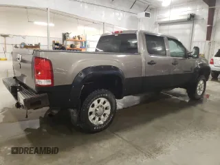 2012 GMC Sierra 2500HD SLT с VIN 1GT121EGXCF156087, выставлен на аукционе Copart как лот 56414505 с пробегом 140 909 миль миль и Списание • Salvage title. История ставок и продаж доступна на DreamBid. Изображение 3.