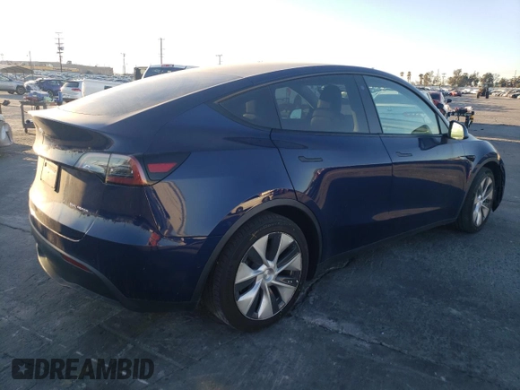 2021 Tesla Model Y Long Range with VIN 5YJYGDEE8MF148849, listed as a Copart auction lot 80894154 with 61,022 mi miles and Salvage Title. Bid and sale history available at carsss.com. Image 3.