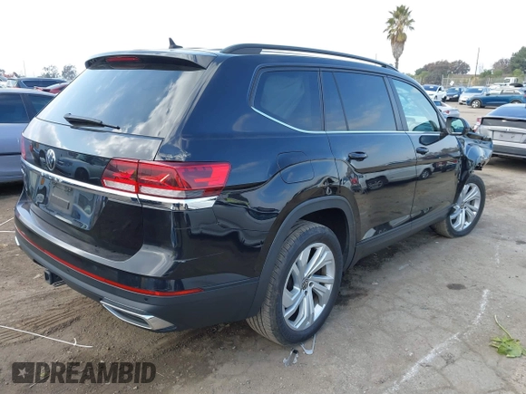 2021 Volkswagen Atlas SE z VIN 1V2WR2CAXMC558294, wystawiony jako IAAI lot #41447619 z przebiegiem 48 652 mil mil oraz . Historia ofert i sprzedaży dostępna na DreamBid. Obrazek 4.