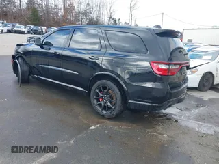 2023 Dodge Durango SRT Hellcat Premium with VIN 1C4SDJH90PC557375, listed as a IAAI auction lot 41328850 with 30,697 mi miles and . Bid and sale history available at DreamBid. Image 3.