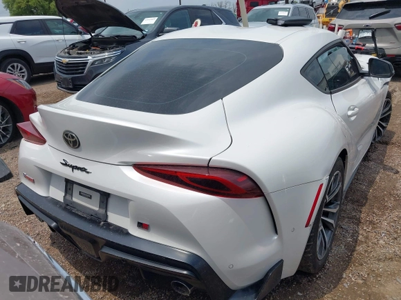 2021 Toyota Supra 2.0 with VIN WZ1DB2C0XMW043249, listed as a IAAI auction lot 42085092 with Not provided miles and . Bid and sale history available at DreamBid. Image 4.