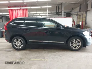 2015 Volvo XC60 T5 z VIN YV4612RK5F2632557, wystawiony jako IAAI lot #42257821 z przebiegiem 151 372 mil mil oraz . Historia ofert i sprzedaży dostępna na DreamBid. Obrazek 13.