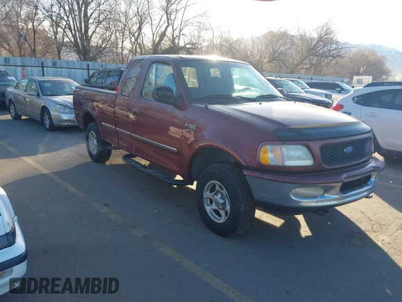 1997 Ford F-150 XL with VIN 1FTDX1869VKA51231, listed as a IAAI auction lot 41846817 with 297,327 mi miles. Bid and sale history available at carsss.com. Image 1.