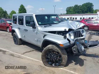 2024 Jeep Wrangler Sahara with VIN 1C4RJXP60RW292136, listed as a IAAI auction lot 42280063 with 26,701 mi miles and . Bid and sale history available at DreamBid. Image 1.