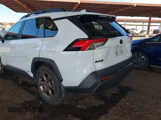 2023 Toyota RAV4 Hybrid XLE with VIN 2T3UWRFV1PW154391, listed as a IAAI auction lot 41302404 with 86,579 mi miles. Bid and sale history available at carsss.com. Image 3.