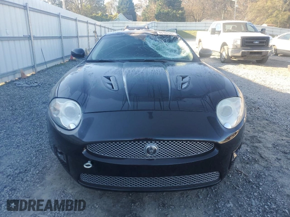 2007 Jaguar XK with VIN SAJWA43C779B19601, listed as a Copart auction lot 80102504 with 78,313 mi miles and Salvage Title. Bid and sale history available at carsss.com. Image 5.