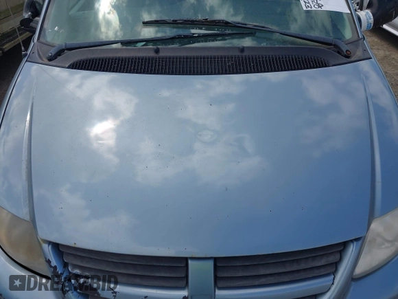 2005 Dodge Caravan SXT with VIN 2D4GP44LX5R528909, listed as a IAAI auction lot 42248957 with Not Provided miles and . Bid and sale history available at DreamBid. Image 10.