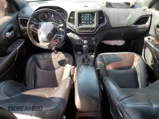 2021 Jeep Cherokee 80th Anniversary with VIN 1C4PJMMX2MD106233, listed as a Copart auction lot 52980415 with 77,979 mi miles and Salvage title. Bid and sale history available at DreamBid. Image 8.