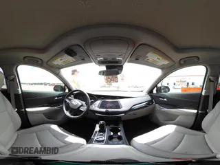 2020 Cadillac XT4 FWD Luxury z VIN 1GYAZAR4XLF146598, wystawiony jako IAAI lot #42211317 z przebiegiem 37 313 mil mil oraz . Historia ofert i sprzedaży dostępna na DreamBid. Obrazek 18.