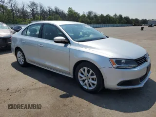2013 Volkswagen Jetta SE with VIN 3VWDP7AJ6DM444111, listed as a Copart auction lot 60243665 with 47,005 mi miles and Salvage title. Bid and sale history available at DreamBid. Image 4.