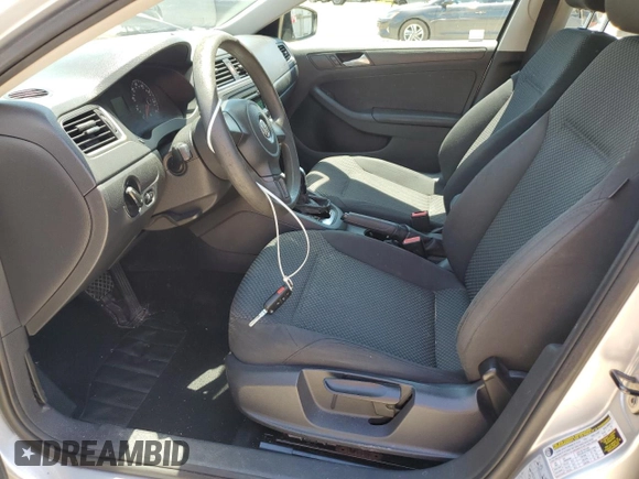 2014 Volkswagen Jetta S with VIN 3VW2K7AJ3EM227817, listed as a Copart auction lot 61415465 with 121,248 mi miles and Salvage title. Bid and sale history available at DreamBid. Image 7.