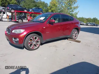 2014 BMW X6 xDrive35i z VIN 5UXFG2C57E0C44052, wystawiony jako IAAI lot #40231766 z przebiegiem 131 573 mil mil oraz . Historia ofert i sprzedaży dostępna na DreamBid. Obrazek 2.