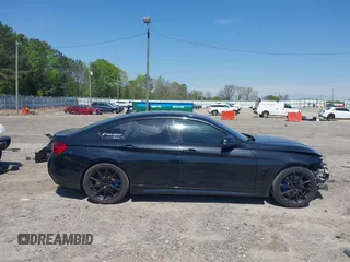 2019 BMW 4 Series 430i with VIN WBA4J1C59KBM17309, listed as a IAAI auction lot 42011443 with 87,189 mi miles. Bid and sale history available at carsss.com. Image 14.