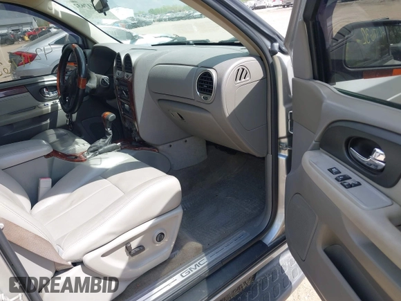 2005 GMC Envoy SLE z VIN 1GKDT13S852271545, wystawiony jako IAAI lot #42117632 z przebiegiem 213 355 mil mil oraz . Historia ofert i sprzedaży dostępna na DreamBid. Obrazek 5.