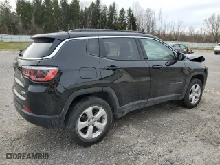 2019 Jeep Compass Latitude with VIN 3C4NJDBB8KT599275, listed as a Copart auction lot 52447025 with 104,576 mi miles and Salvage Title. Bid and sale history available at carsss.com. Image 3.