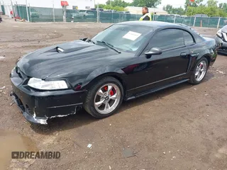 2001 Ford Mustang GT Deluxe with VIN 1FAFP42X01F256120, listed as a IAAI auction lot 42446560 with Not provided miles and . Bid and sale history available at DreamBid. Image 2.