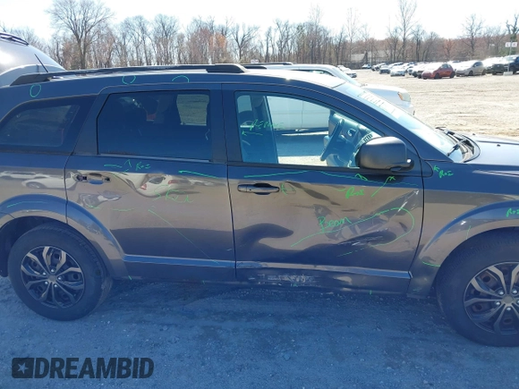 2017 Dodge Journey SE with VIN 3C4PDCAB0HT701026, listed as a IAAI auction lot 41797969 with 80,477 mi miles and . Bid and sale history available at DreamBid. Image 17.